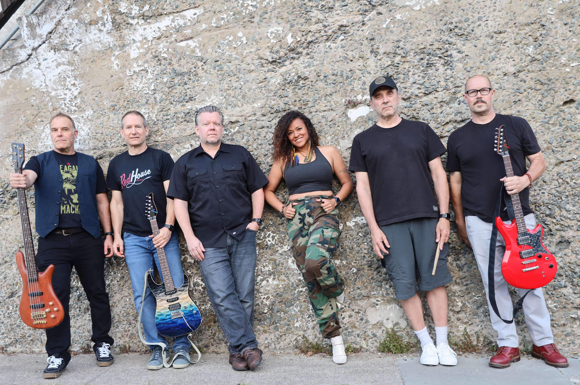 Audiorage against a concrete wall